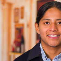 Native American man smiling at camera
