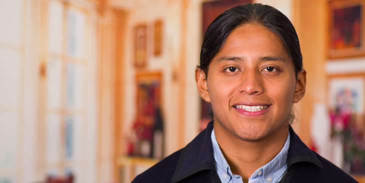 Native American man smiling at camera