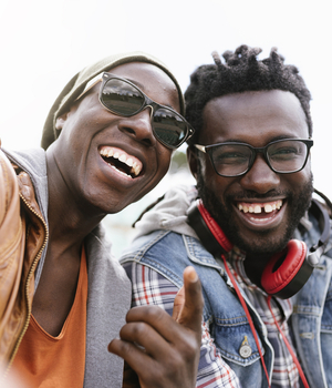 two black men laughing