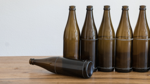 beer bottles with one on its side