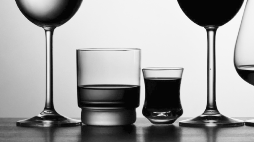 different types of glasses with alcohol