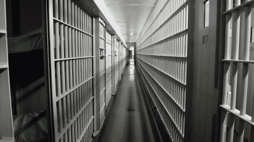 center of jail cell hallway