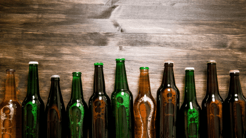 collection of unopened beer bottles