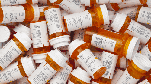 pile of prescription pill bottles