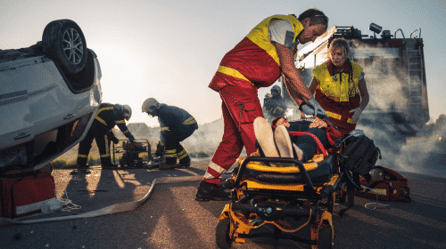 traffic collision injured person on stretcher