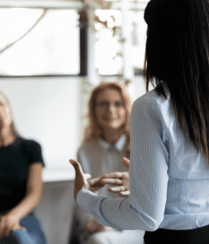 woman speaking to group