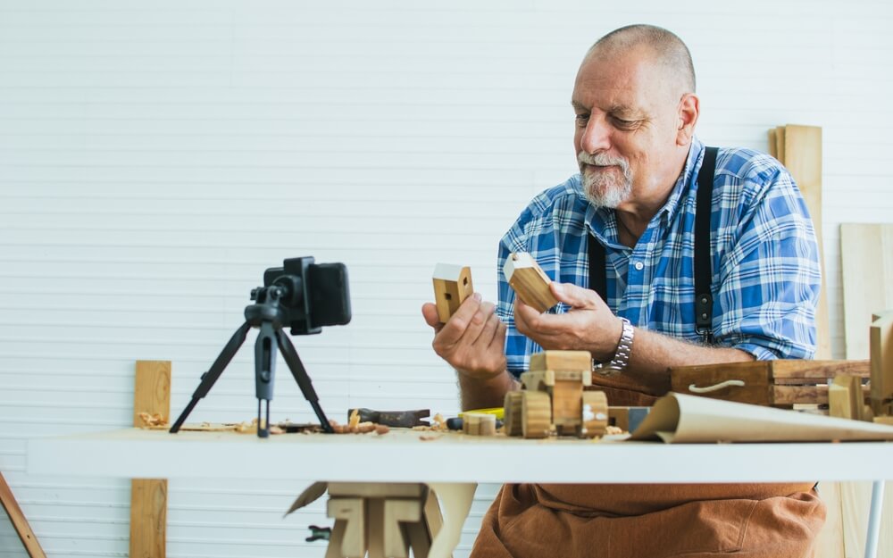 A middle aged man films himself assembling something. Learn more about life after rehab here
