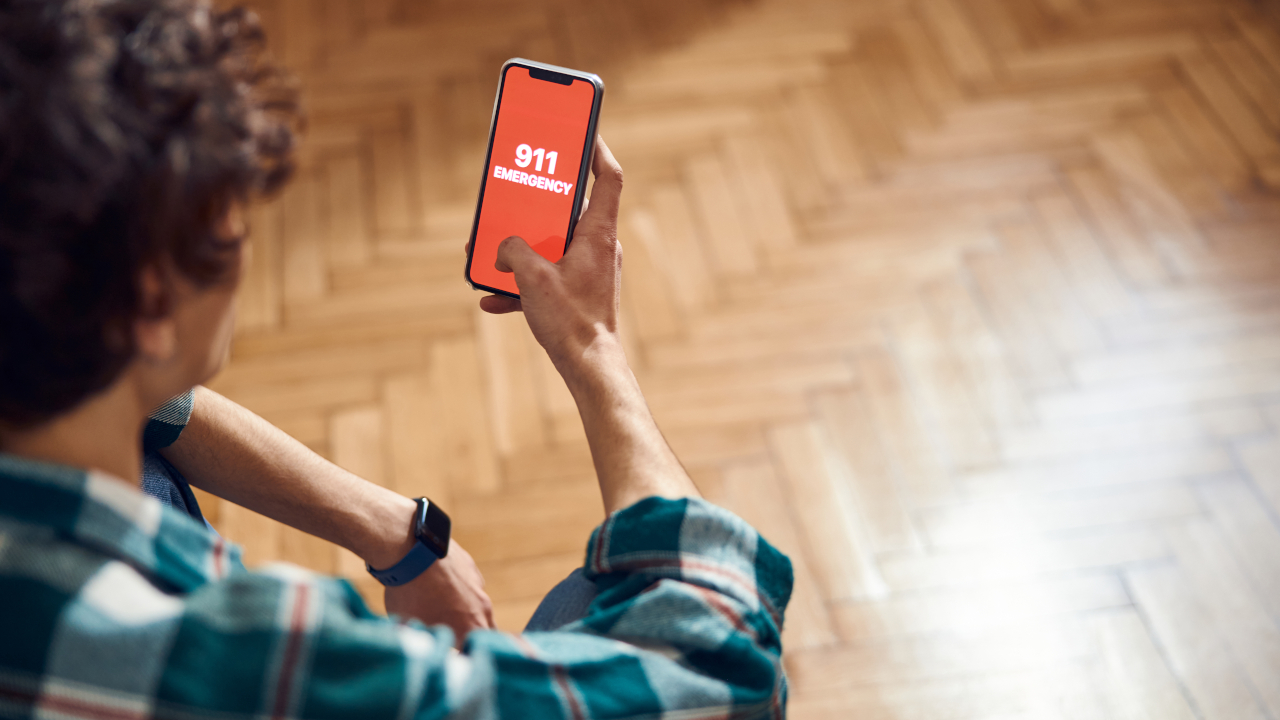 A person dials 9-1-1. Learn more about emergency and mental health crisis phone numbers here.