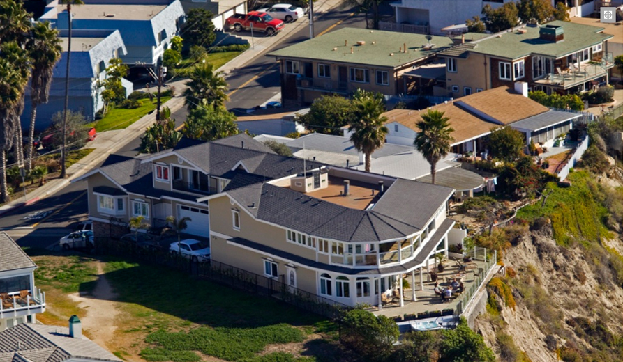 Exterior aerial view showing multi-building treatment facility complex on San Clemente coastline with ocean views and residential surroundings