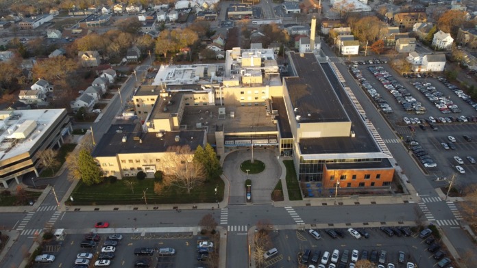Aerial view of Miriam Hospital campus showing multiple buildings, parking areas, and surrounding neighborhood