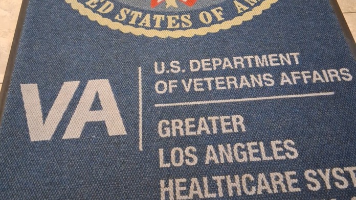 Interior floor mat showing VA Department of Veterans Affairs and Greater Los Angeles Healthcare System Santa Maria VA CBOC branding