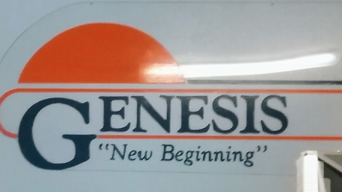Interior signage displaying Genesis Recovery Services logo with 'New Beginning' tagline on wall