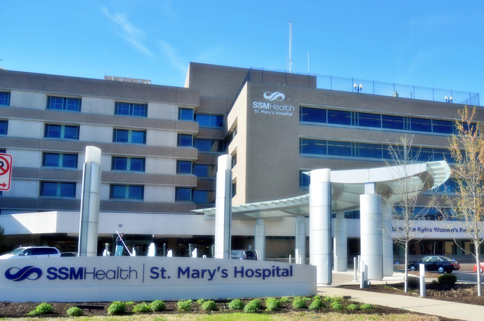 Exterior view of SSM Health St. Mary's Hospital main entrance with modern architecture, columned portico, and landscaping