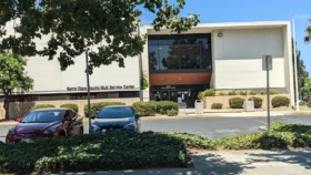 Exterior view of Santa Clara County Multi Service Center showing main entrance with landscaping and parking area