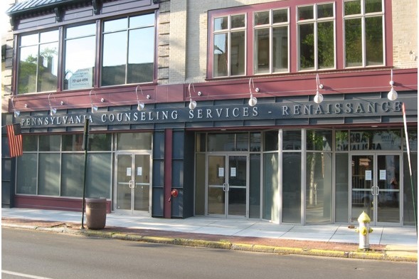 Exterior street view of Pennsylvania Counseling Services Renaissance entrance with signage, glass doors, windows, and storefront design