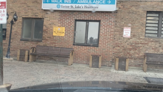 Exterior brick building showing St. Luke's Emergency Department signage with walk-ins and ambulance entrance directions