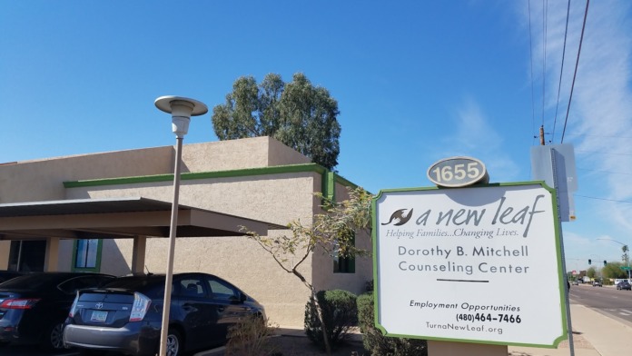 Exterior view of A New Leaf Dorothy B. Mitchell Counseling Center with address 1655, signage, parking area, and landscaping