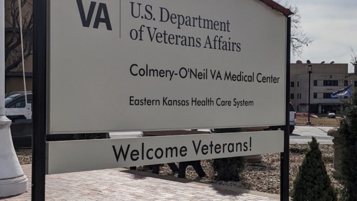 Facility entrance sign for VA Medical Center with Veterans Affairs branding and welcome message