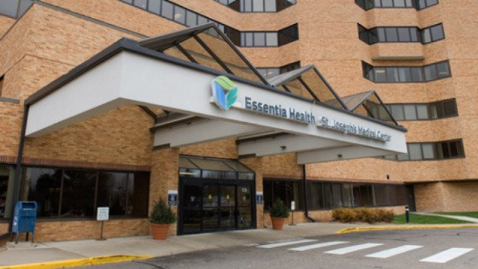 Exterior view of Essentia Health Saint Joseph Medical Center with brick facade, covered entrance, and signage
