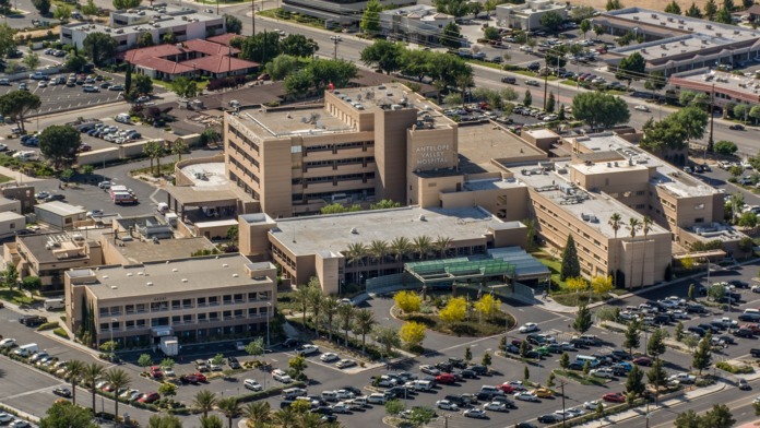 Exterior aerial view of Antelope Valley Medical Center showing multi-story buildings, parking areas, and surrounding landscape