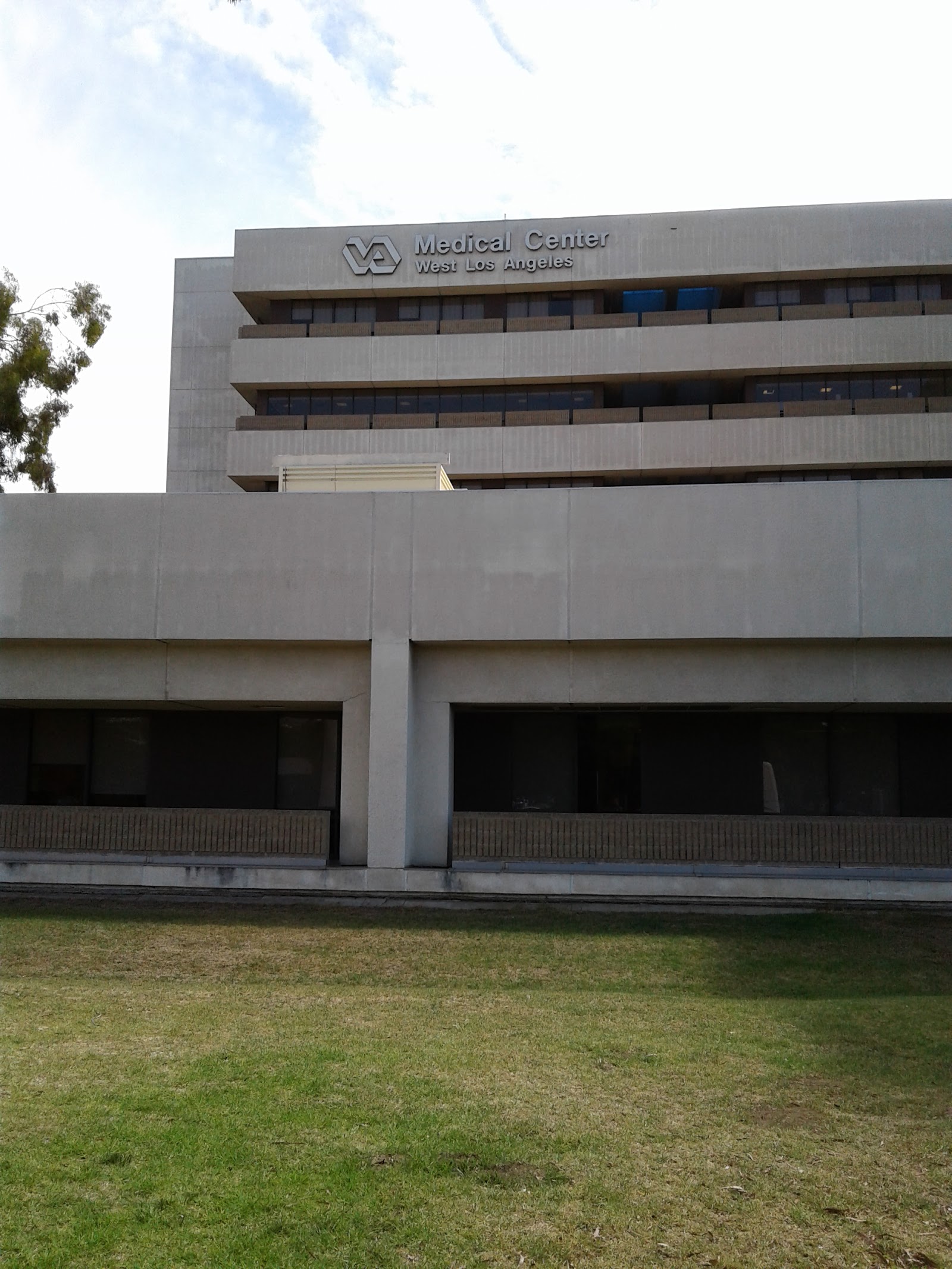 Exterior signage displaying VA Medical Center West Los Angeles name on building facade